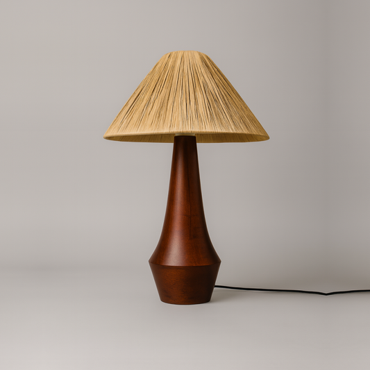 Wooden table lamp with a straw-like shade on a neutral background